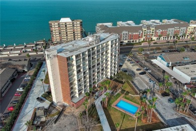 Very well-kept condo 2- bedroom 2 bath 2 cover parking garage on