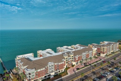 Very well-kept condo 2- bedroom 2 bath 2 cover parking garage on