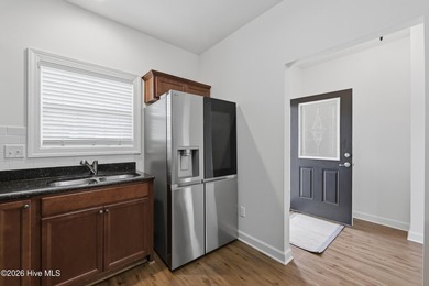 Enjoy easy living in this charming 2-bedroom, 2-bath brick patio - photo 8
