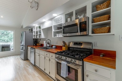 Welcome to 1043 Clift Cave Drive, where breathtaking waterfront - photo 17