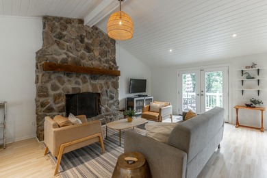 Welcome to 1043 Clift Cave Drive, where breathtaking waterfront - photo 18