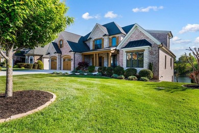 This LAVISH and STUNNING home on the lake offers a blend of - photo 2
