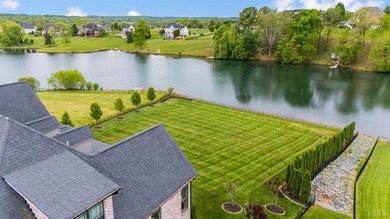 This LAVISH and STUNNING home on the lake offers a blend of - photo 5