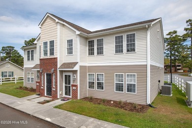 Welcome to easy, low-maintenance coastal living in the heart of - photo 1