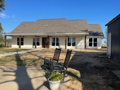 This beautiful move in ready lake house is open and airy and SOLD - Lake Home SOLD! in Saint Joseph, Louisiana