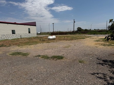 2.5 Acres Super Location Fronting Loop 250N! Improvements