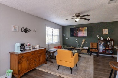 Bright and stylish 2-bedroom condo in Central City featuring an - photo 2