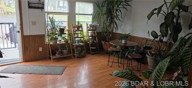 Large lakefront family home tucked back in a protective cove for - photo 12