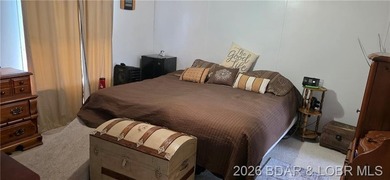 Large lakefront family home tucked back in a protective cove for - photo 16