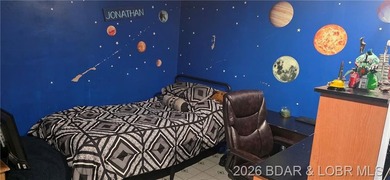 Large lakefront family home tucked back in a protective cove for - photo 19