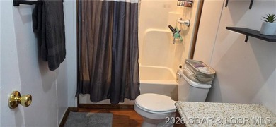 Large lakefront family home tucked back in a protective cove for - photo 21
