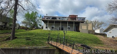 Large lakefront family home tucked back in a protective cove for - photo 26