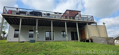 Large lakefront family home tucked back in a protective cove for - photo 27