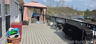 Large lakefront family home tucked back in a protective cove for - photo 29