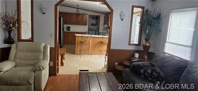 Large lakefront family home tucked back in a protective cove for - photo 36