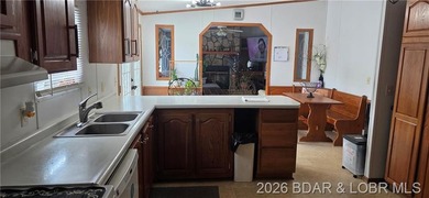 Large lakefront family home tucked back in a protective cove for - photo 38