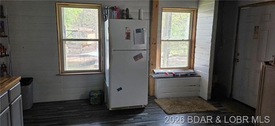 Large lakefront family home tucked back in a protective cove for - photo 39