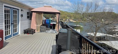 Large lakefront family home tucked back in a protective cove for - photo 41
