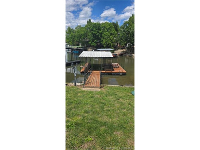 Large lakefront family home tucked back in a protective cove for - photo 48