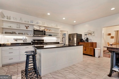 LOCATED WITHIN MINUTES TO THE MURRAY'S COVE BOAT RAMP FOR LAKE - photo 11