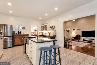 LOCATED WITHIN MINUTES TO THE MURRAY'S COVE BOAT RAMP FOR LAKE - photo 12