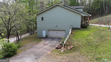 LOCATED WITHIN MINUTES TO THE MURRAY'S COVE BOAT RAMP FOR LAKE - photo 47