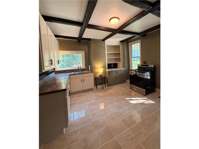 Welcome to this beautifully remodeled two-story home that - photo 7