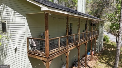 LOCATED WITHIN MINUTES TO THE MURRAY'S COVE BOAT RAMP FOR LAKE - photo 50