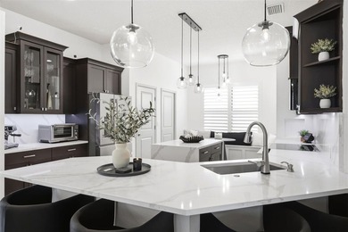 Welcome to 1115 Ketzal Drive, an exceptional custom-built - photo 11