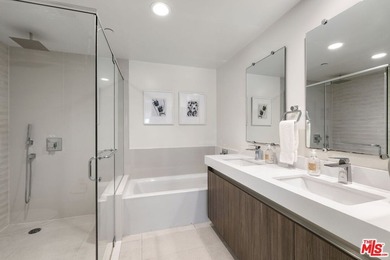 Stunning newer contemporary condo right across the street from - photo 16