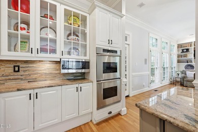 Quietly tucked away in North Ridge, this custom estate captures - photo 17