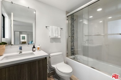 Stunning newer contemporary condo right across the street from - photo 21