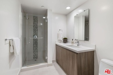 Stunning newer contemporary condo right across the street from - photo 22