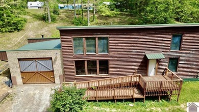**Unique Lakeside Retreat in Kuttawa!** Discover one of the most - photo 38