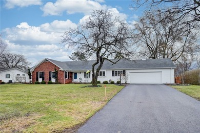 This beautifully updated 4-bedroom, 3.5-bath ranch sits on