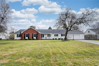 This beautifully updated 4-bedroom, 3.5-bath ranch sits on