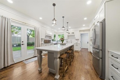 Welcome to this beautifully updated 4-bedroom, 3 full bath, and - photo 15