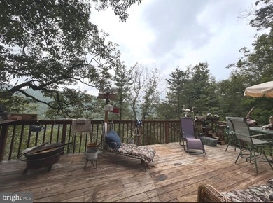 This rustic mountain cabin offers the perfect blend of privacy - photo 15