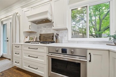 Welcome to this beautifully updated 4-bedroom, 3 full bath, and - photo 18