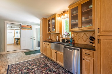 Tastefully renovated and meticulously maintained, this three - photo 7
