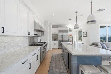 LOCATED JUST FOUR HOUSES FROM THE STRAND, this beautifully - photo 16