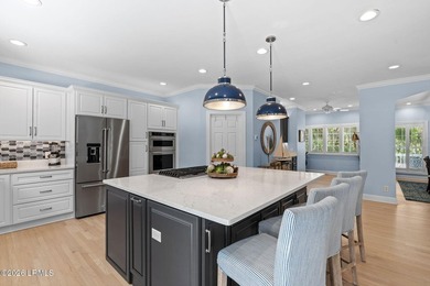 Set on a beautifully manicured half-acre lot overlooking the - photo 21