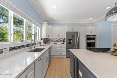 Set on a beautifully manicured half-acre lot overlooking the - photo 22