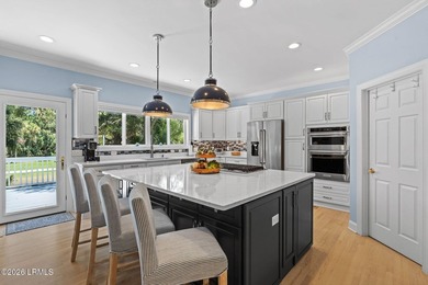 Set on a beautifully manicured half-acre lot overlooking the - photo 23