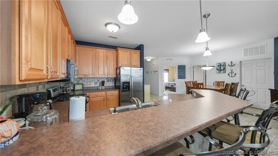 Right in the heart of Osage Beach, this Lands' End condo puts - photo 11