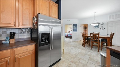 Right in the heart of Osage Beach, this Lands' End condo puts - photo 12