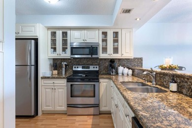 Beautiful furnished 2 bedroom 2 bath unit with open kitchen and - photo 13