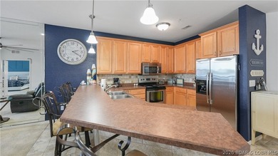 Right in the heart of Osage Beach, this Lands' End condo puts - photo 16