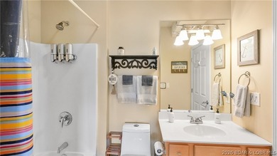 Right in the heart of Osage Beach, this Lands' End condo puts - photo 25