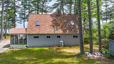 Take in sweeping views of Sebago Lake from the porch, dock, deck - photo 6